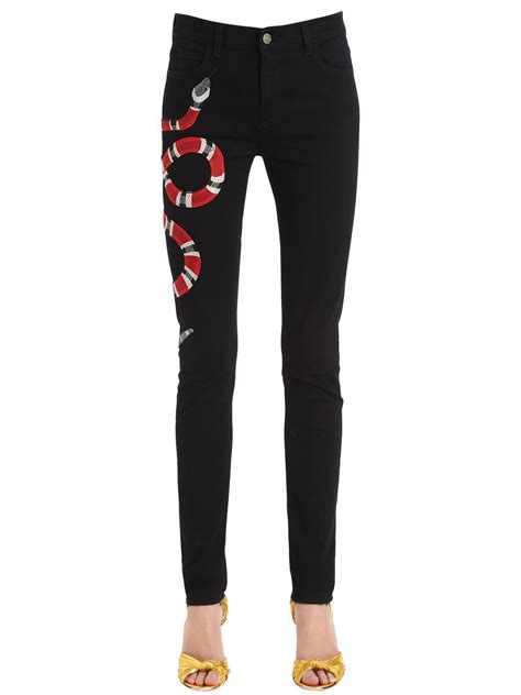 gucci snake pants cheap|gucci snake jeans women.